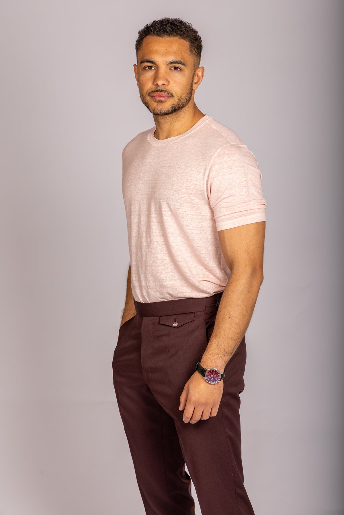 Model wearing a soft pink crew neck T-shirt – Featherstone London smart casual menswear