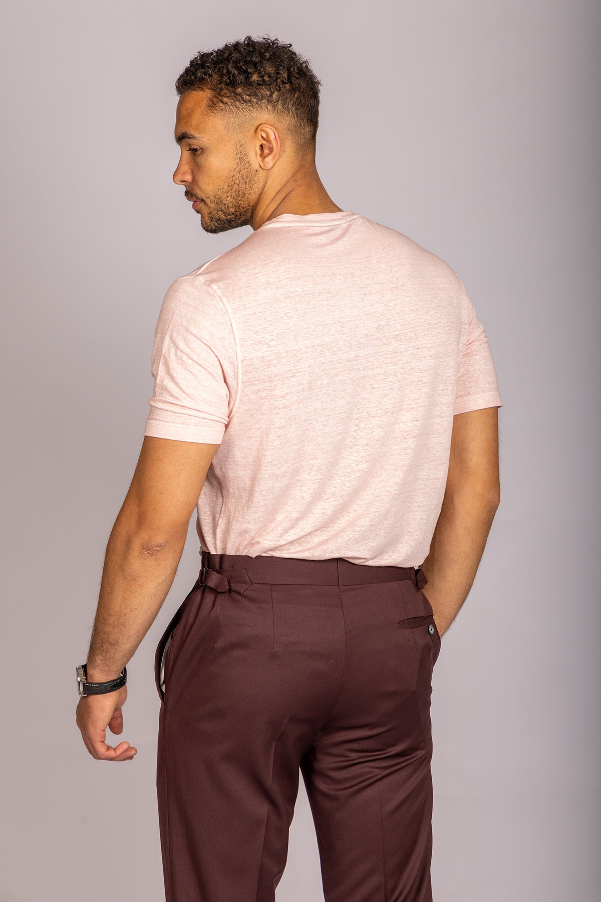 Rear View Model wearing a soft pink crew neck T-shirt – Featherstone London smart casual menswear