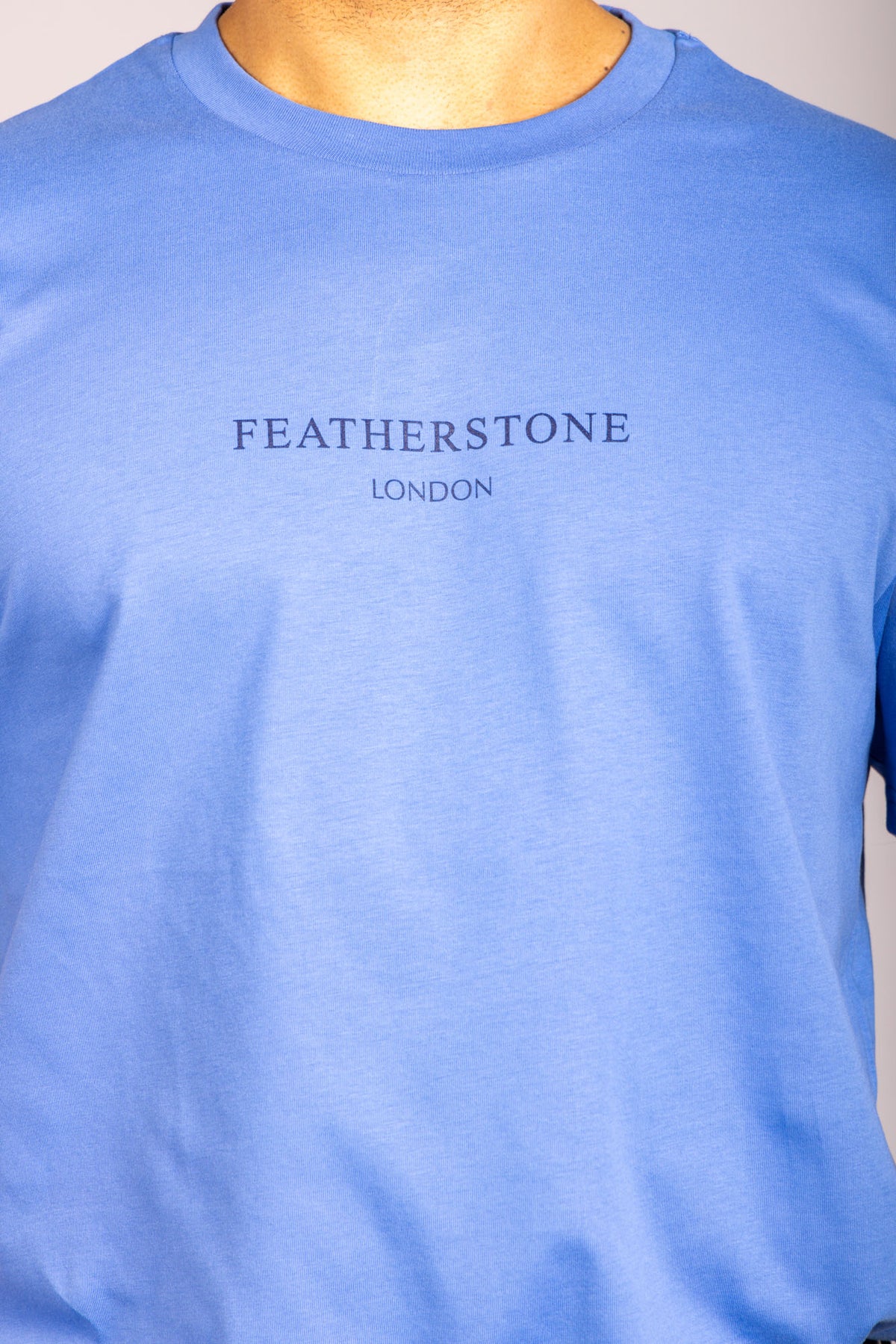 Men’s cobalt blue logo T-shirt – short sleeve crew neck by Featherstone London - Close Up