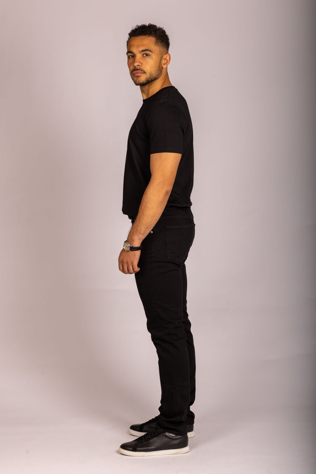 Men’s black logo T-shirt – short sleeve crew neck by Featherstone London - Side View