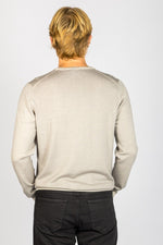 Back view of ash beige wool long sleeve jumper with ribbed hem