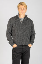Front view of Featherstone London charcoal marl wool button neck jumper