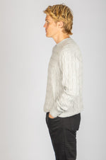 Side profile of light grey wool-cashmere blend cable knit jumper