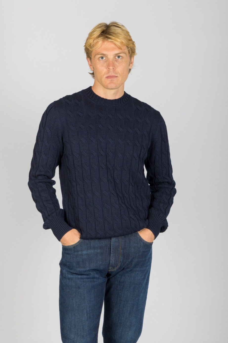Front view of Featherstone London navy wool-cashmere blend cable knit crew neck jumper