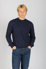 Front view of Featherstone London navy wool-cashmere blend cable knit crew neck jumper