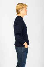 Side profile of navy cable knit wool-cashmere jumper