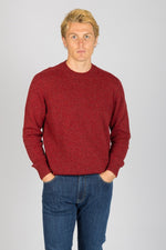 Front view of Featherstone London red marl wool crew neck jumper