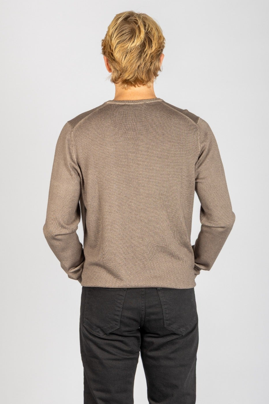 Back view of taupe wool long sleeve jumper with ribbed hem