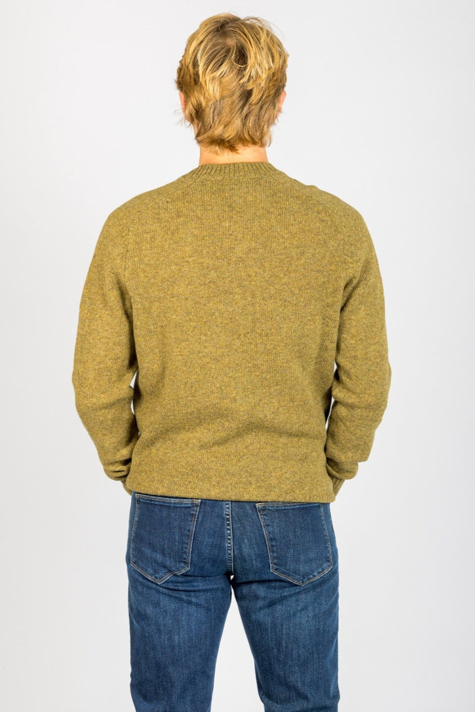 Back view of moss marl wool crew neck jumper with ribbed hem
