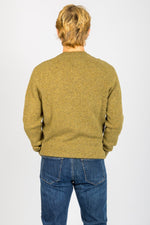 Back view of moss marl wool crew neck jumper with ribbed hem