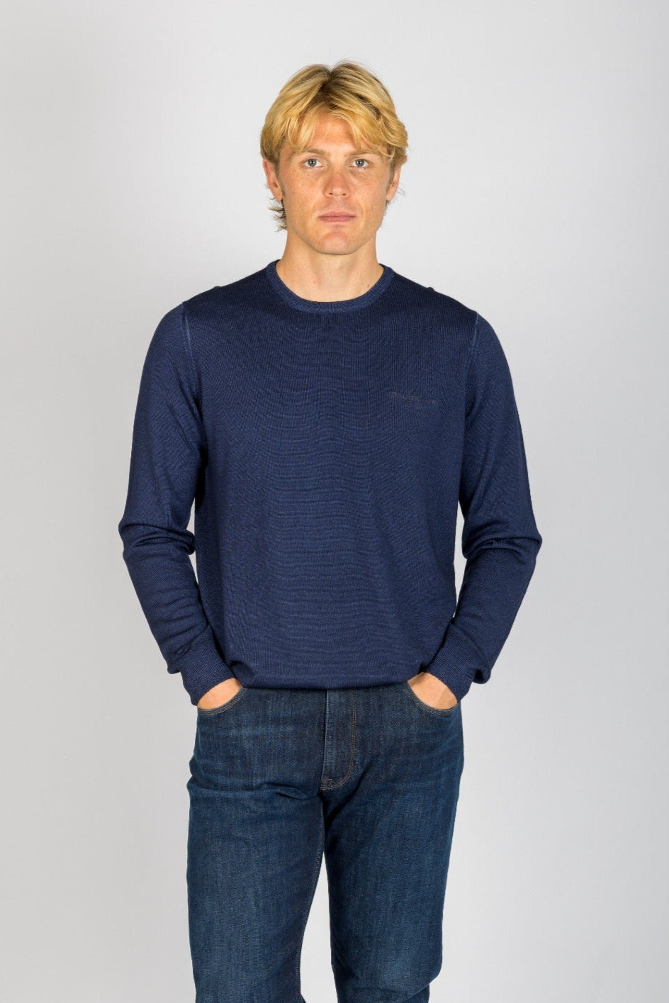 Front view of Featherstone London navy wool crew neck jumper with embroidered logo